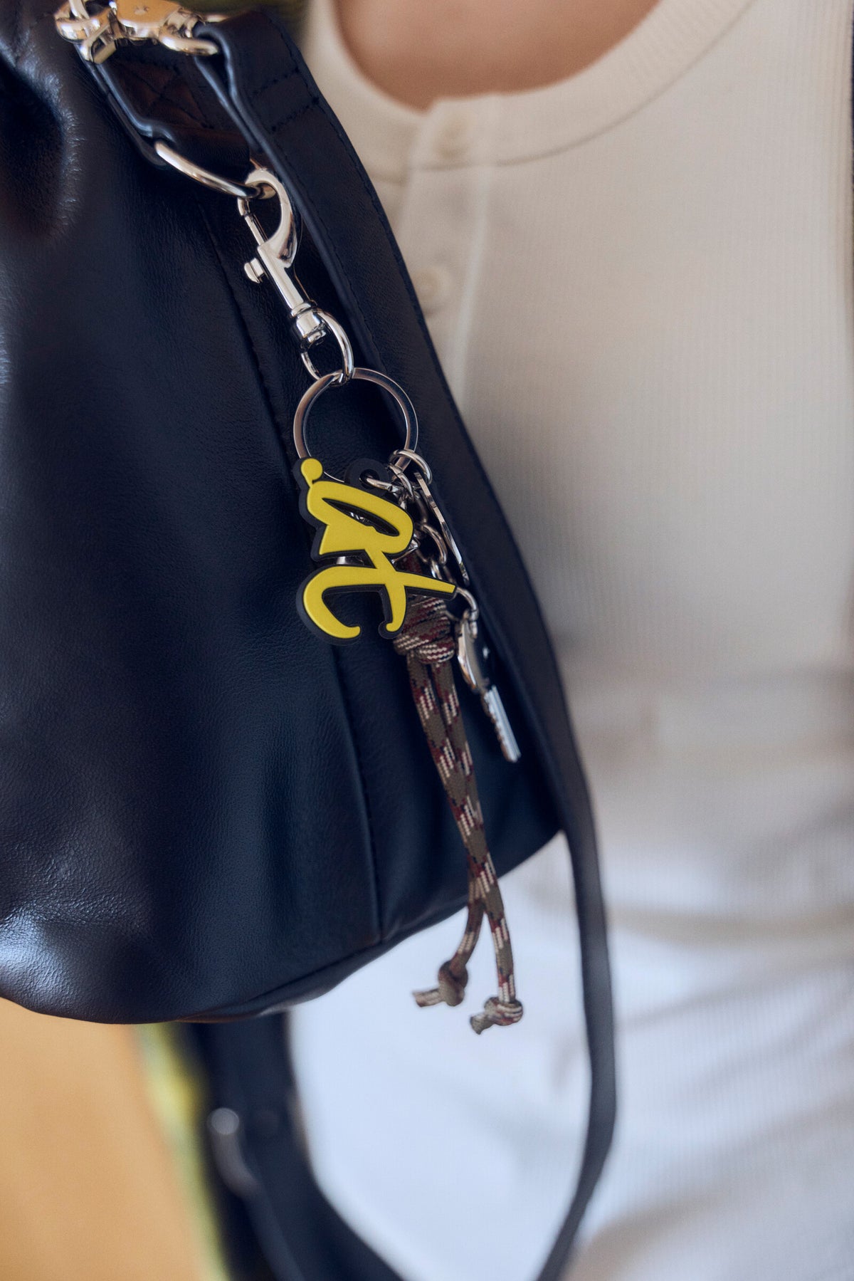 .at - key ring charm - Yellow